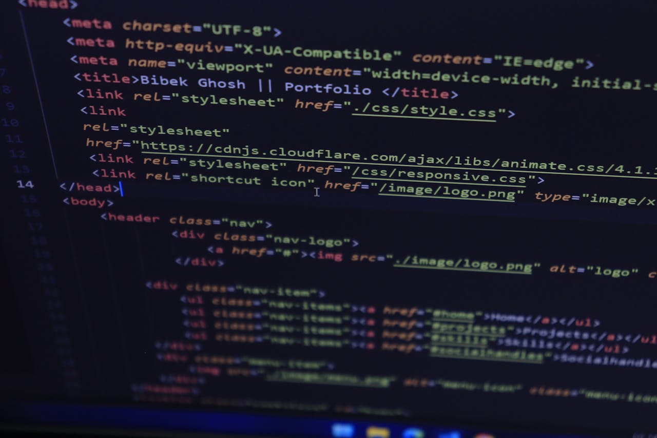 services-02 Close-up of HTML and CSS code displayed on a computer screen, ideal for tech and programming themes.