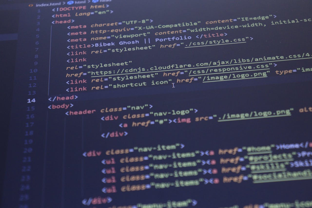 hero-img Close-up view of HTML and CSS code displayed on a computer screen, ideal for programming and technology themes.